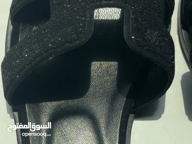 Black Sandals in Ajman