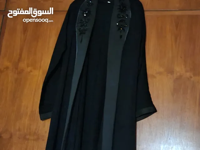 عبايه مع فستان كبس