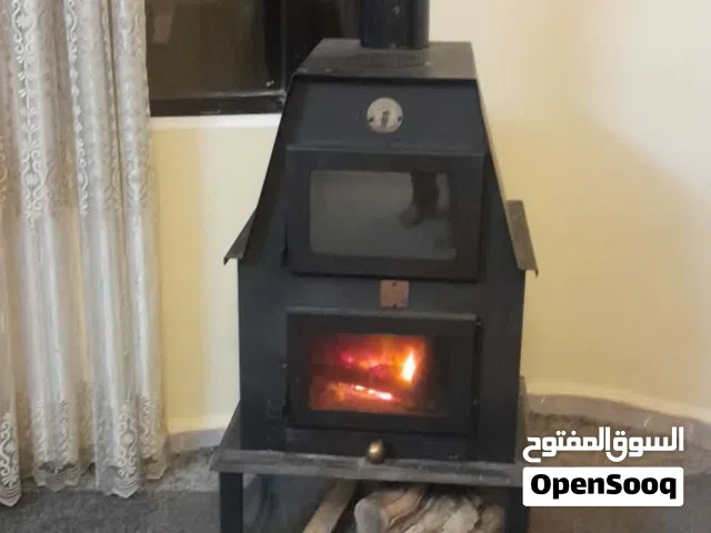 مدفأة حطب +بواري