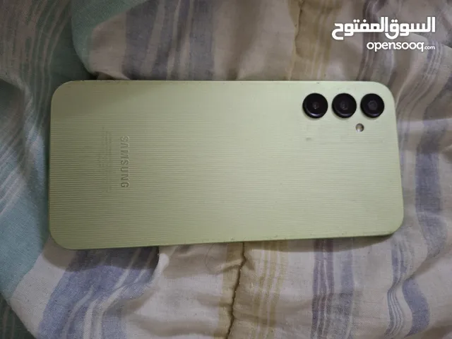 Samsung galaxy A14 للبيع بصمة اصبع جانبية لون أخضر فاتح حالته ممتازة كاميرات التلفون واضحه جدا