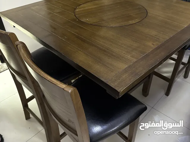 Wood table middle spin 4 chairs