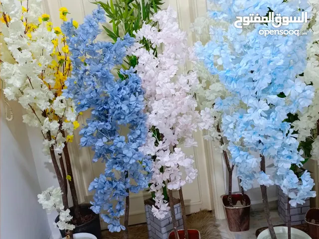 أشجار صناعي بجذع طبيعي شامل القوار