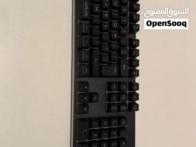 Black mouse and keyboard