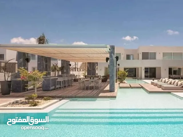 mk شاليه للبيع علي البحر مباشرة في هايد بارك الساحل الشمالي hide park north coast 3 غرف بتشطيب كامل