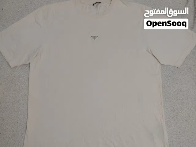 تيشرت PRADA  اصلي شبه جديد  بلبس قياس 3xl    4xl