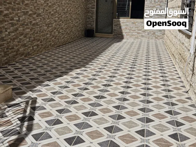 شقه أرضية  مميزة للبيع في حي المنصور باعلى التشطيبات و الديكور  و اعلا تقنية منزل ذكي