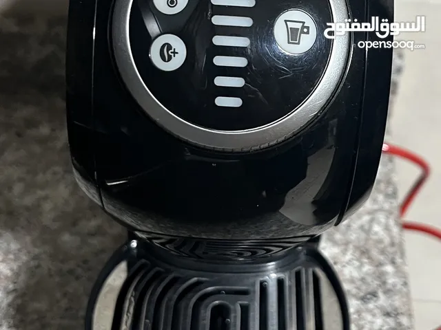 Nescafe Dolce Gusto machine + Holder capsule ماكنة نسكافيه دولتشي غوستو + حمالة كبسولات