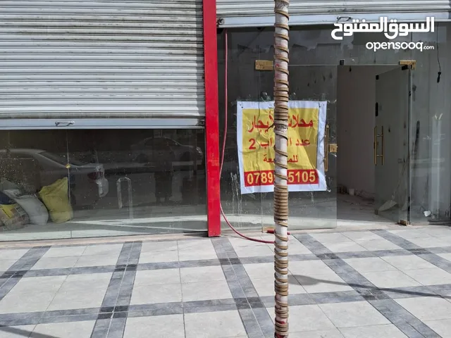 محلات تجاريه عدد 2 مقابل نادي الضباط،شارع،وصفي التل الزرقاء