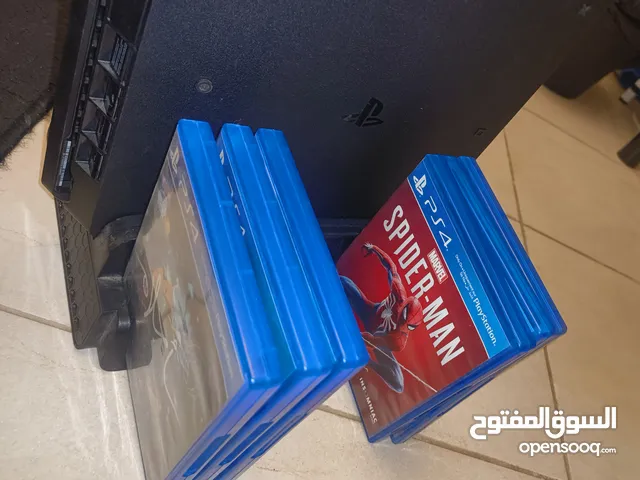 USED PS4 with 6 games and vertical cooling and charging station بلايستيشن 4 مستعمل + 6 ألعاب + قاع