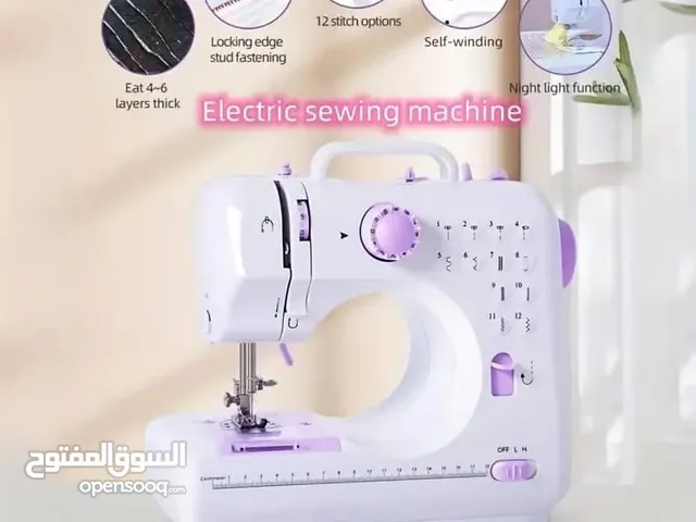 مكينة خياطة سفري