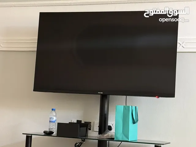 تلفزيون مع الطاوله جديد ستخدام شخصي تقريباً سبوعين
