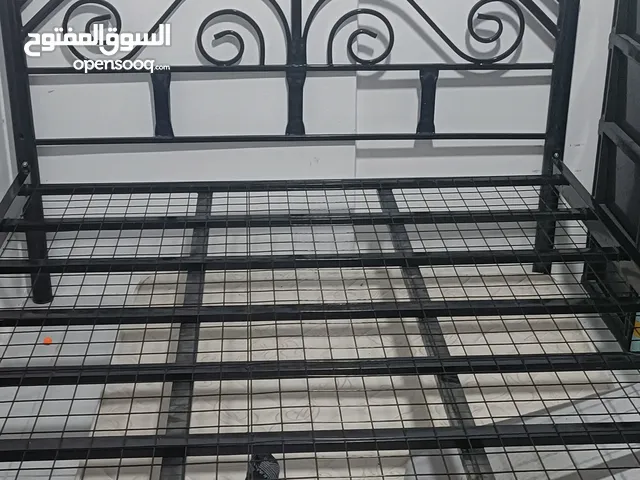queen size bed with spring mattress
