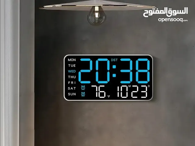 ساعة حائط إلكترونية مضيئة تعمل بالكهرباء او البطارية