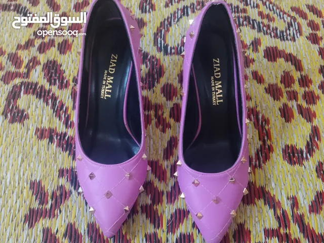 Purple With Heels in Baghdad