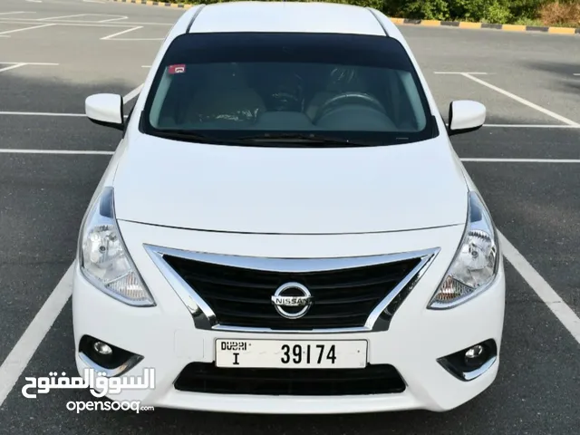 Nissan - Sunny-2022 White Daily, Weekly, Monthly Rental Available, Parking Sensor, car play, Audio.