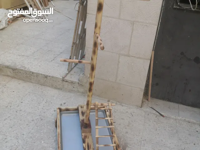ستاندات ببغاء أحجام وأشكال مختلفة من الخشب