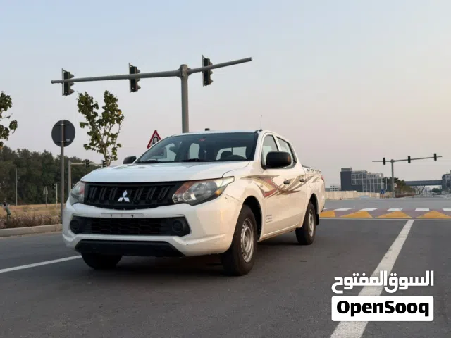 ميتسوبيشي L200 غمارتين بحالة ممتازة  Mitsubishi L200 Double Cab - Excellent condition