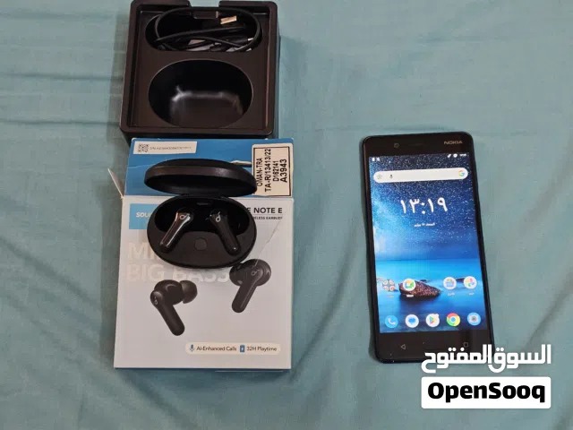 Nokia 8 phone with Bluetooth earphones