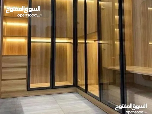 هدية طاولة شاشة بمناسبة العيد الوطني متخصصون في تصميم وتفصيل غرف الملابس