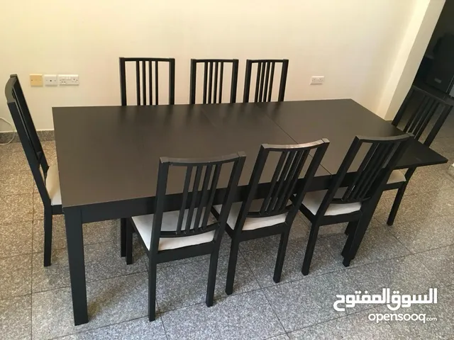 Extendable dining table with 8 chairs