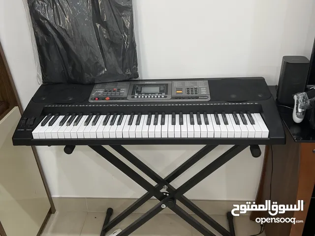 Piano with stand and bag