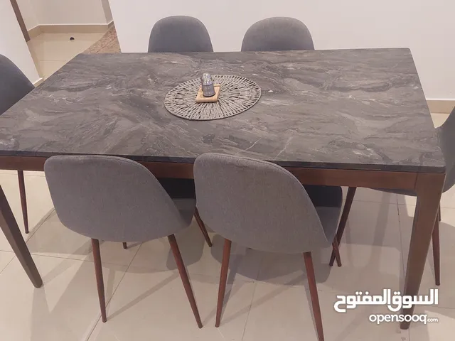 Home center 6 seater wooden table with stone top