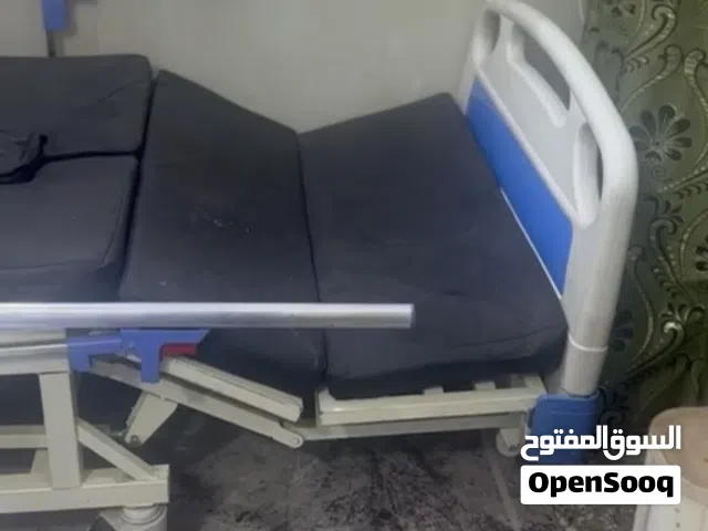 سرير طبي كهربائي