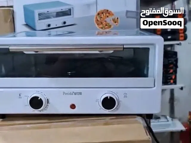 فرن كهربائي يشوي كيك معجنات وسمك وبيتزا ودجاج