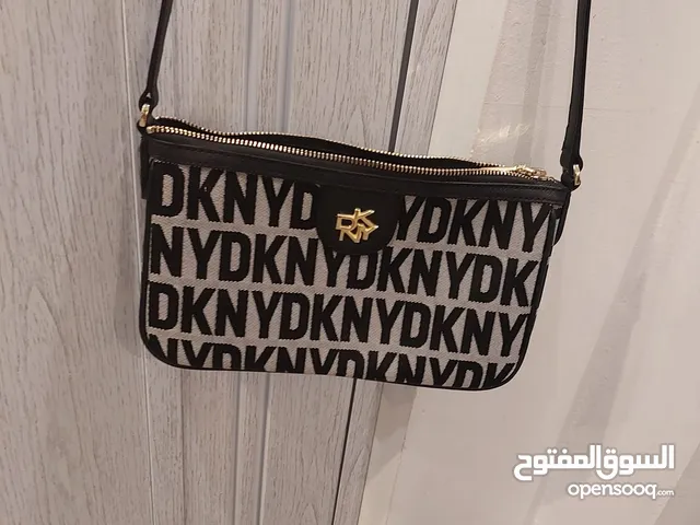 شنط أصليه جديدة