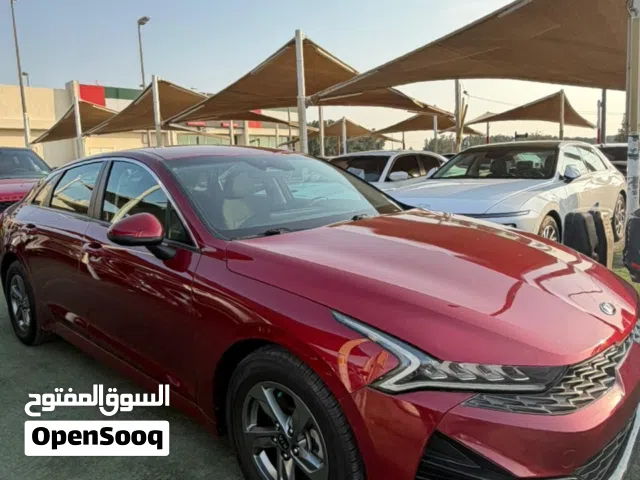 KIA K5 (2021) -LOW MILEAGE -750 AED/MONTH كيا كي 5 بلون خمري ممشى قليل متاح للتقسيط البنكي بدون دفعة