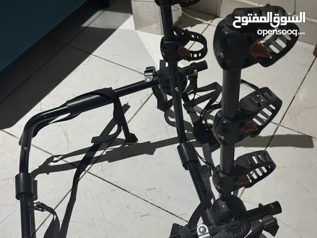 Bicycle holder for carrying bikes in car