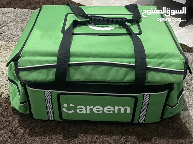 شنطة كريم + شنطة توصيل بدون لوغو (بحالة جيدة جدا )