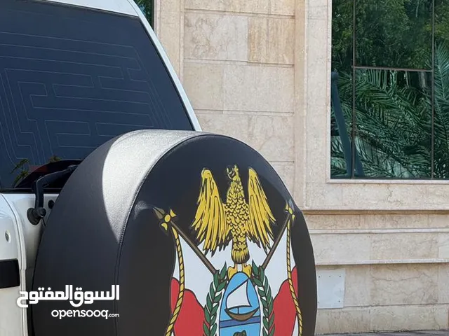 غطاء سبير جلد شعار دبي وابوظبي + شعار دبي حق الشبك