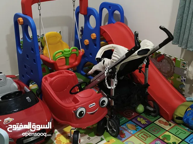 play ground for kids, car , slide, trampoline and swing .