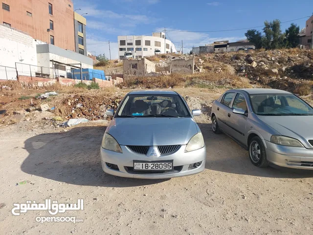 لانسر 2005 وارد الكويت 4 جيد ماتور 1600 الاصلي "الملا"