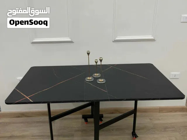طاوله قابله للطوي ومتحركه وقويه ومتينه موجود  بشكل دائري ومستطيل بسعر40 دينار فقط شامل التوصيل
