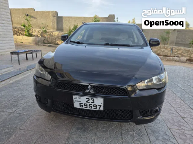 2014 ميتسوبيشي لانسر GLS