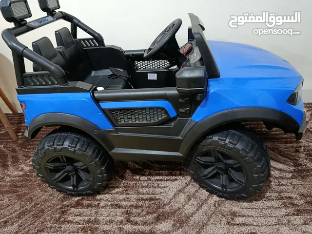 سيارة شحن كهرباء تحكم دعسات وتحكم ريموت عن بعد وتحكم دعسات جدبد بحال الوكالة