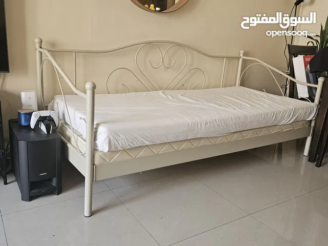 single sized bed with two mattresses