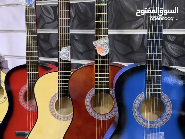 جيتار تعليمي كلاسيك جديد كولتي ممتاز بالكرتونه مع ريشه هديه وكفاله