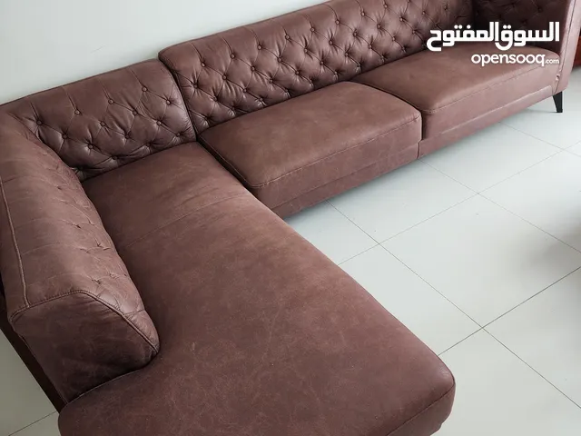 Brown L shape sofa