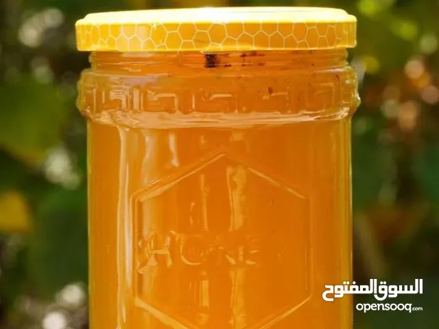 عسل فاكهة الحمضيات طبيعي 100٪؜