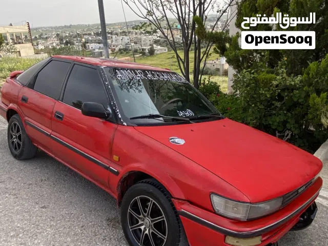 1990 تويوتا كورولا Standard