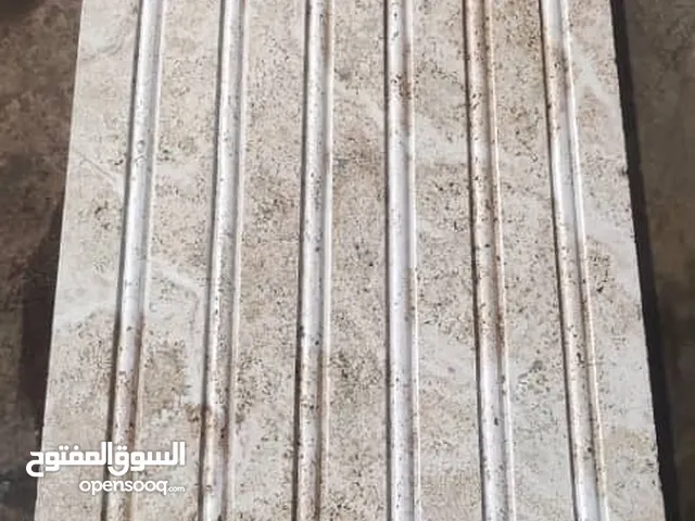 بلاطقه منحنیه،ثلاثی البعاد،حجر تراڤرتين بيج، حجر التراميت