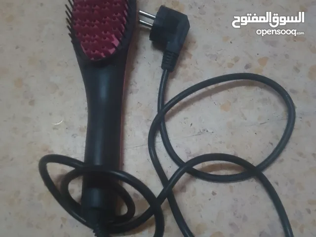 مشط كاوي شعر