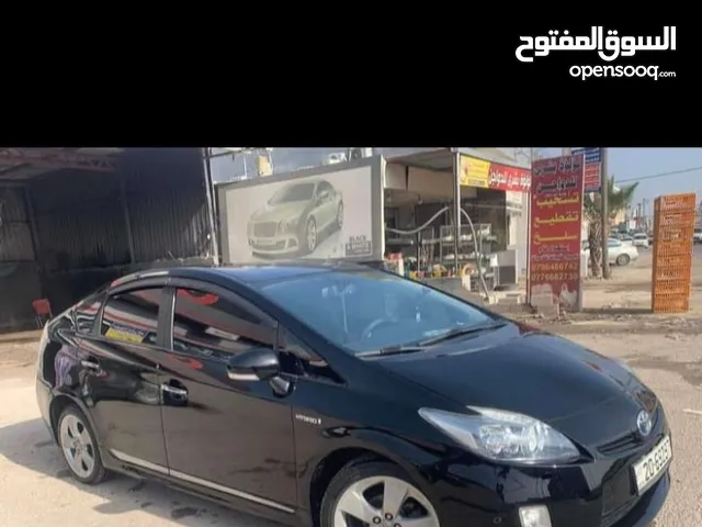 للبيع تيوتا بريوس 2010 عرخصه 2009فحص كامل 7 جيد سياره بحاله الوكاله لون اسود للبيع