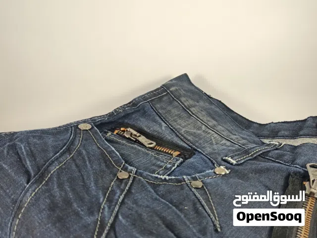 بنطلون جينز رجالي أصلي Cipo & Baxx – تصميم مميز وسحّابات فاخرة – حالة ممتازة