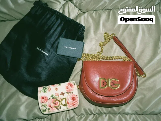 شنطة ومحفظة من Dolce & Gabbana