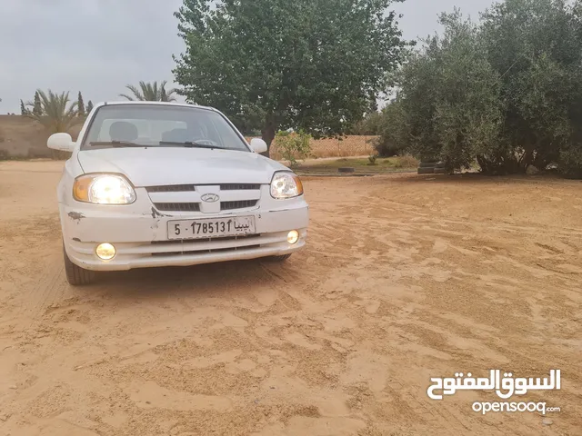 هيونداي فيرنا عدسة 2003