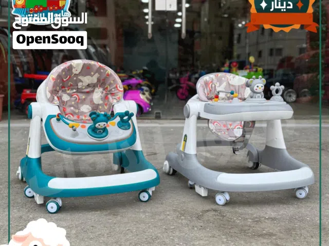 كراجة / عربة تعليم مشي ونطاطه و شمسية و وكر و يد للدفع وموسيقى نخب اول من المصنع مباشره ......